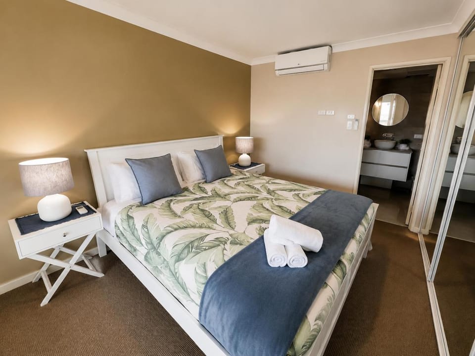 Bed, Bedroom, towels, wardrobe, air conditioner