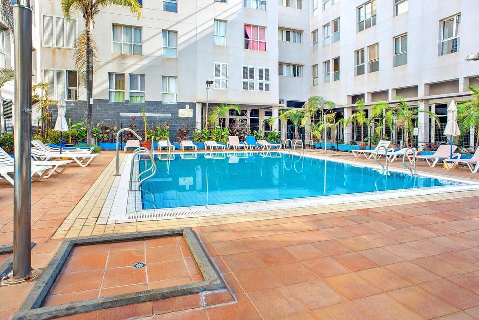 Property building, Living room, Swimming pool