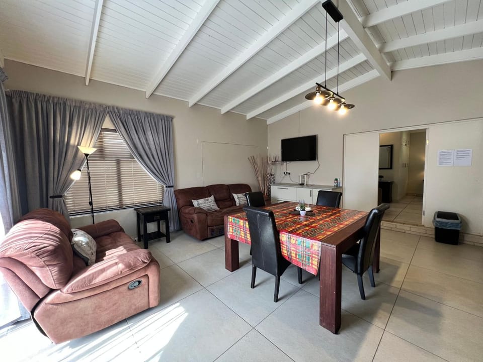 Communal lounge/ TV room, Living room, Seating area, Dining area