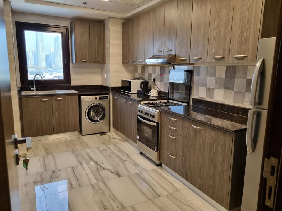 Coffee/tea facilities, Kitchen or kitchenette, oven, washing machine