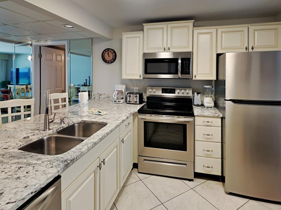 Kitchen or kitchenette, microwave, oven, stove, toaster, kitchen