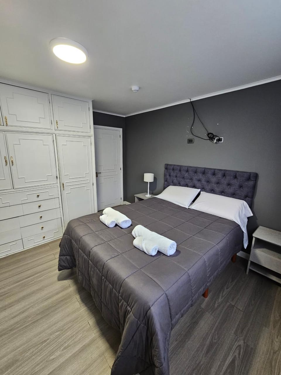 Bed, furniture, towels, wardrobe