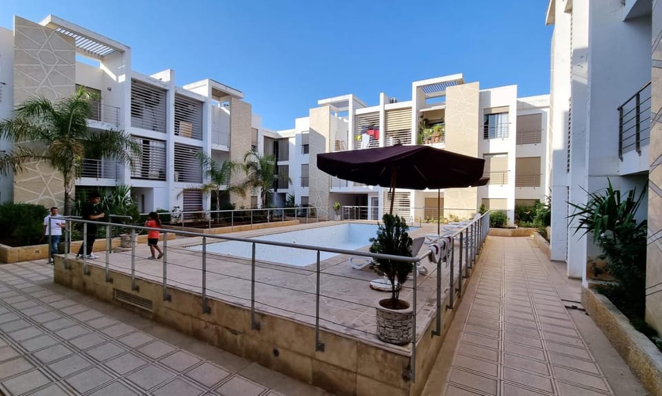 Property building, Patio, Day, Pool view, Swimming pool, Location