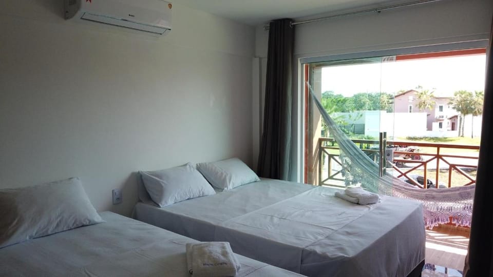 Bed, Balcony/Terrace, Bedroom, towels, air conditioner
