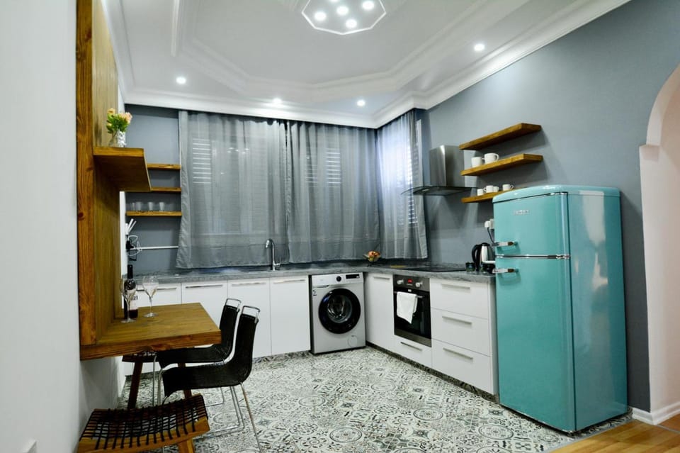 Kitchen or kitchenette, washing machine