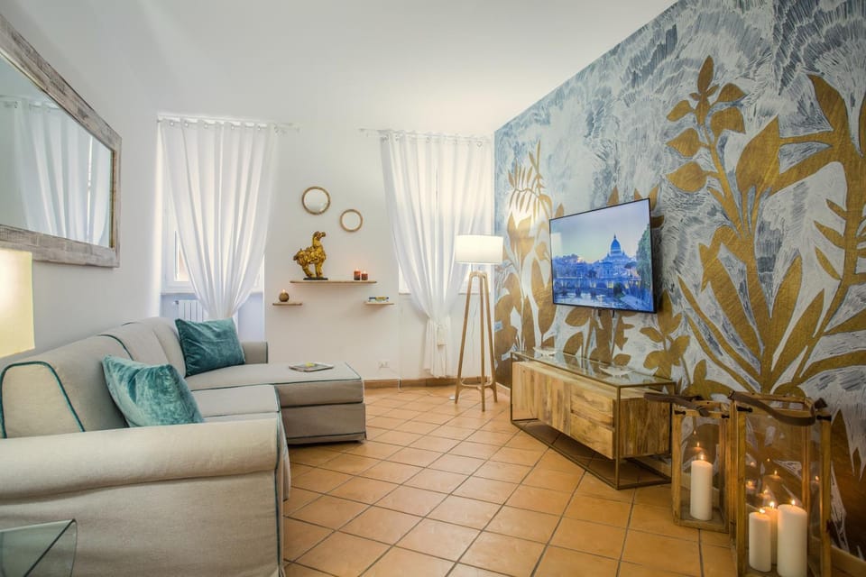 TV and multimedia, Coffee/tea facilities, Living room, Photo of the whole room, Decorative detail, Decorative detail, Seating area, Entertainment, furniture, internet, air conditioner, air conditioner