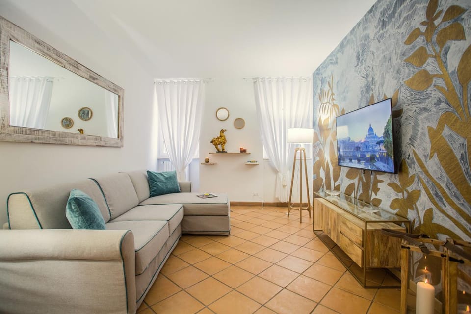 TV and multimedia, Coffee/tea facilities, Living room, Photo of the whole room, Decorative detail, Decorative detail, Seating area, Entertainment, furniture, heating, internet, air conditioner, air conditioner