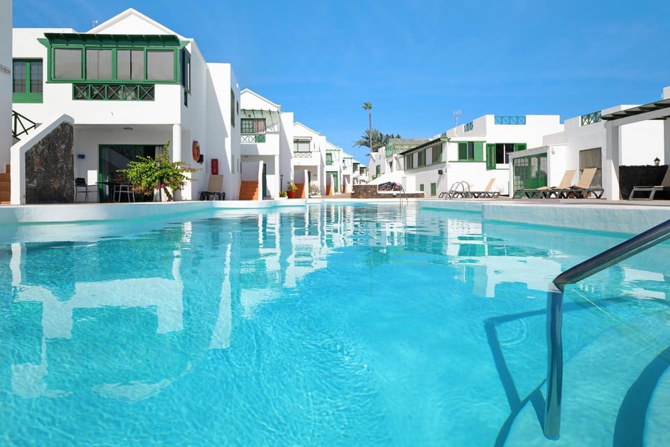 Property building, Living room, Swimming pool