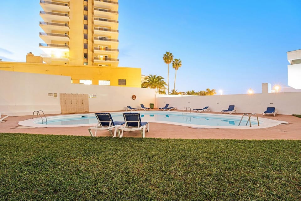 Property building, Living room, Swimming pool