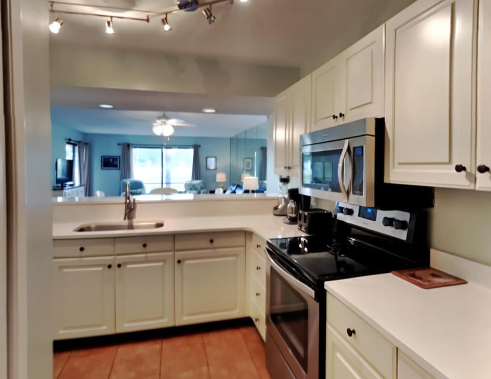 Kitchen or kitchenette, microwave, oven, stove, kitchen
