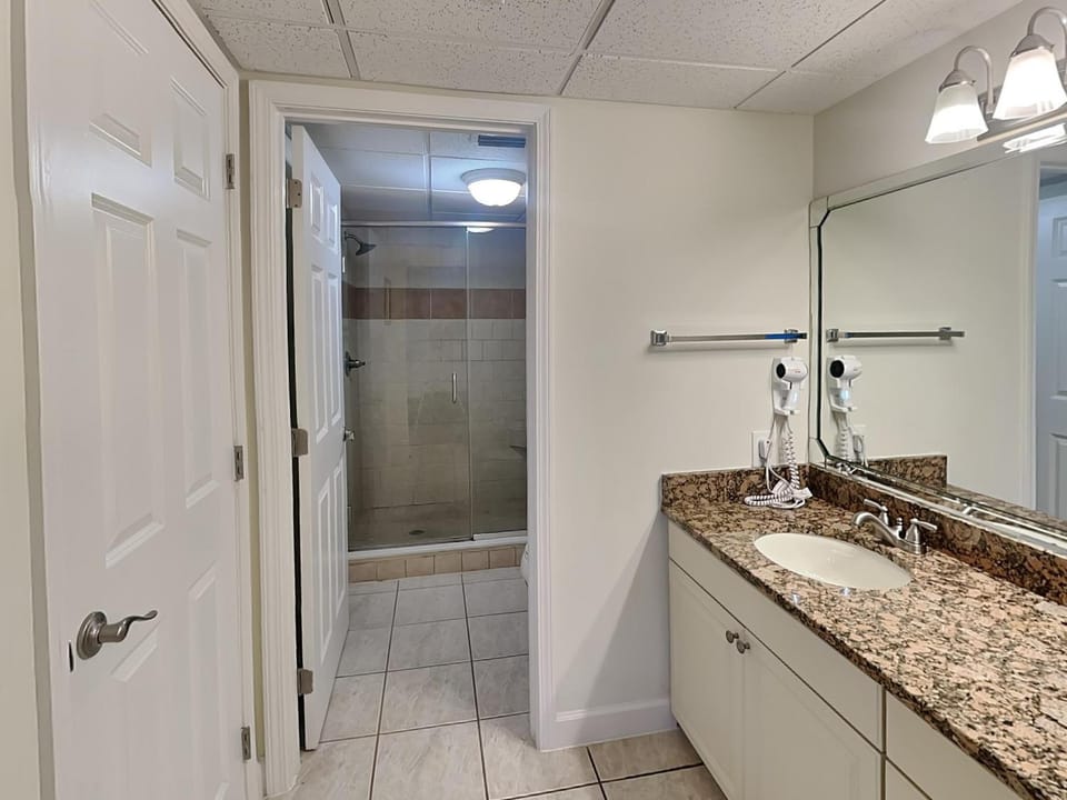 Shower, Bathroom, hair dryier, towels