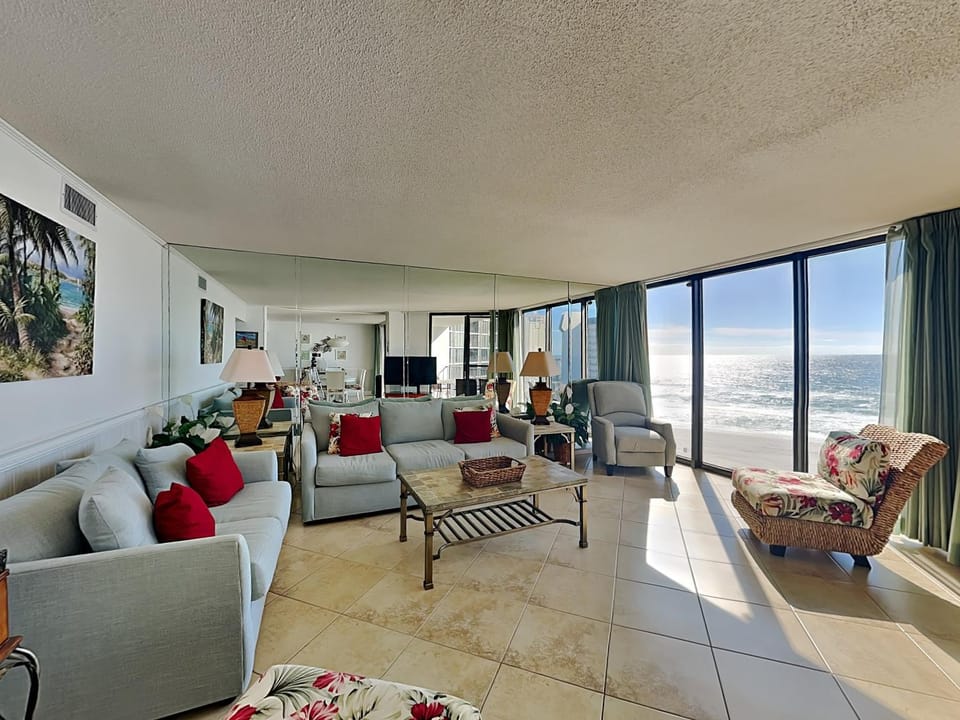 View (from property/room), Living room, Seating area, Sea view, furniture, air conditioner