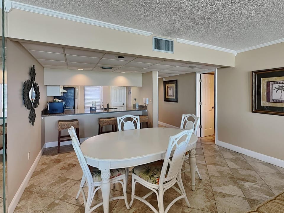 Kitchen or kitchenette, Seating area, Dining area, furniture, air conditioner