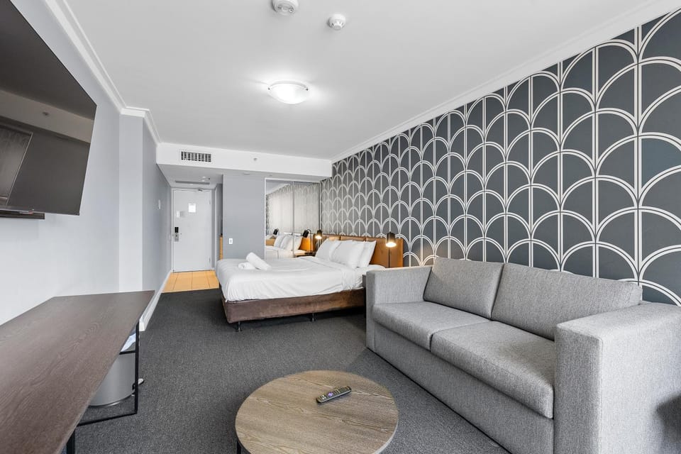 Bed, TV and multimedia, Living room, Seating area