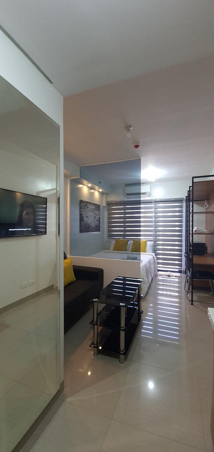 Bed, Living room, Seating area, Bedroom
