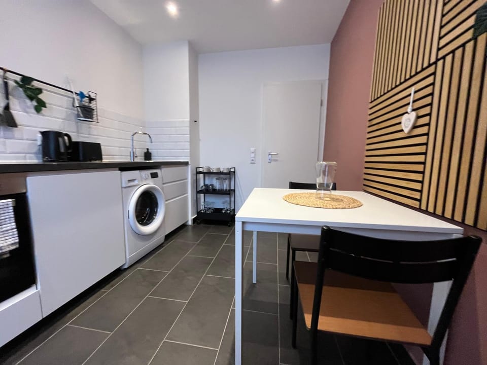 Kitchen or kitchenette, Dining area, dishwasher, oven, stove, washing machine