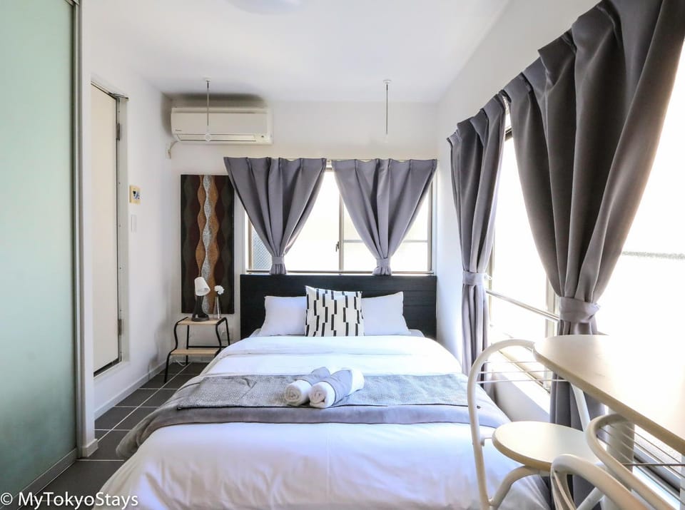Bed, Photo of the whole room, Bedroom, towels, air conditioner