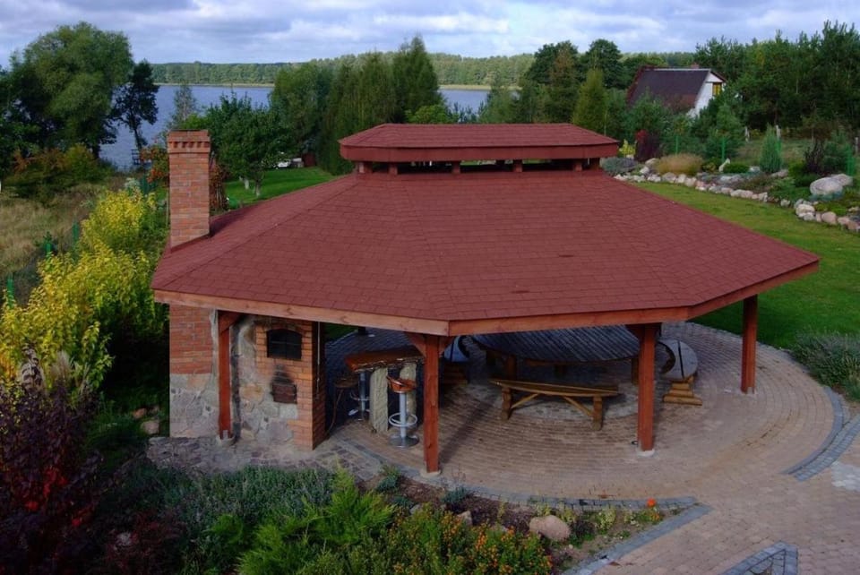 Mazury całoroczny dom nad jeziorem do wynajęcia z własną linią brzegową Villa in Poland