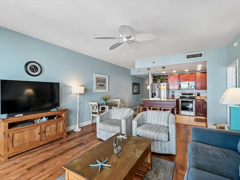 TV and multimedia, Balcony/Terrace, Kitchen or kitchenette, Living room, Seating area, Dining area, furniture, air conditioner