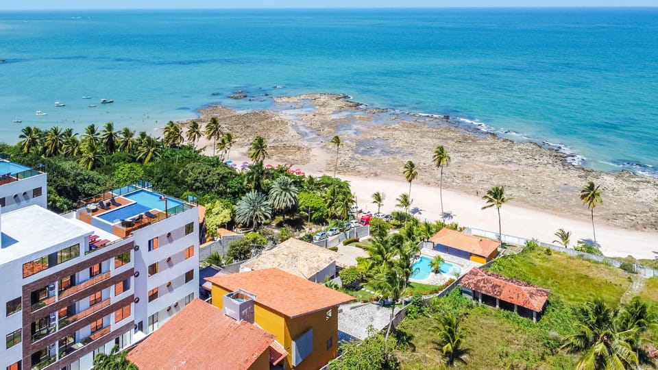 Property building, Nearby landmark, Natural landscape, Bird's eye view, Beach, Pool view, Sea view, Swimming pool