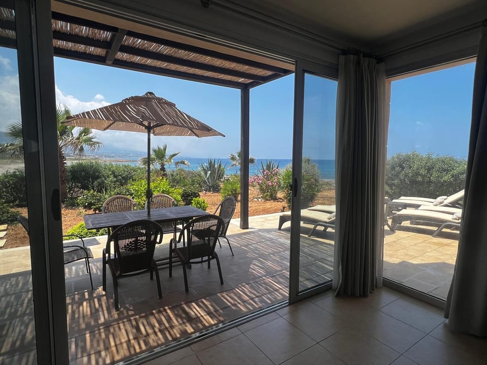 Property building, Natural landscape, Seating area, Sea view, sunbed