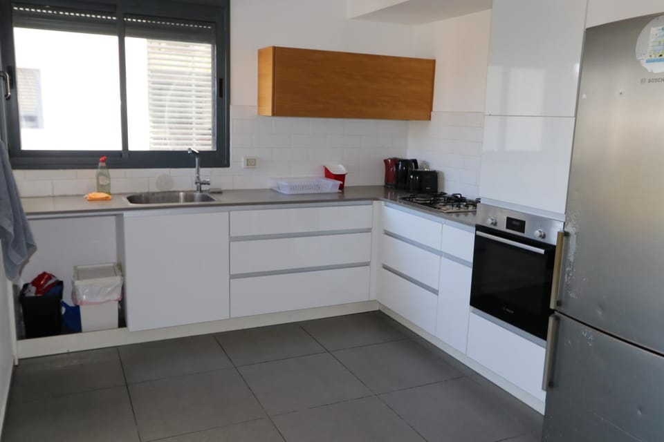 Kitchen or kitchenette, oven, stove, toaster