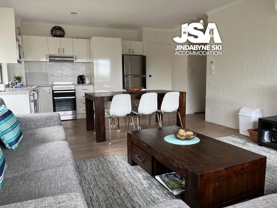 Kitchen or kitchenette, Living room, Seating area, Dining area, dishwasher, oven, stove, toaster