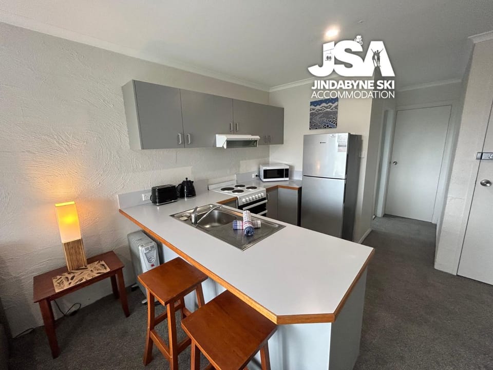 Kitchen or kitchenette, Seating area, Dining area, oven, stove, toaster