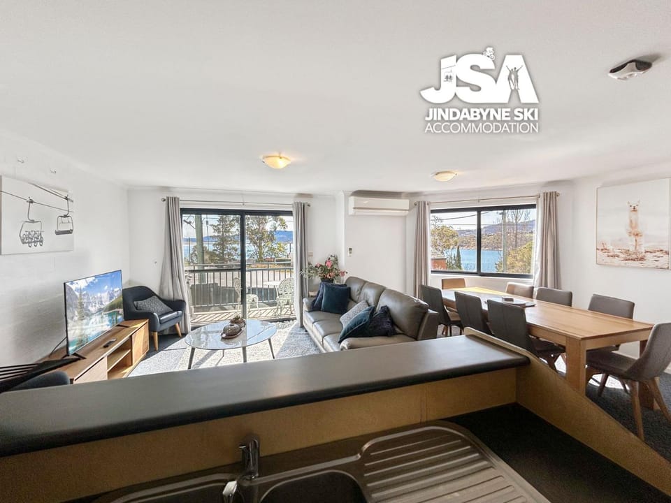 View (from property/room), Living room, Dining area, Lake view, Lake view, Mountain view, Mountain view