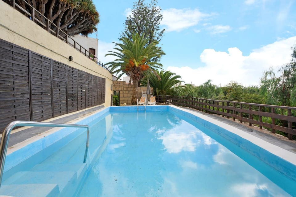 Property building, Living room, Swimming pool
