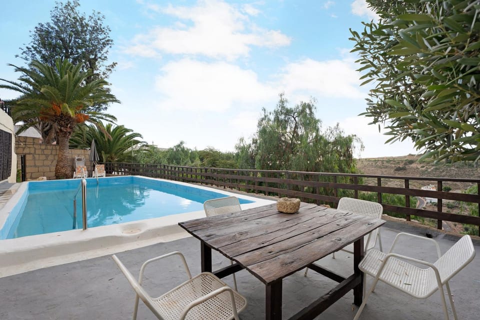 Property building, Living room, Swimming pool