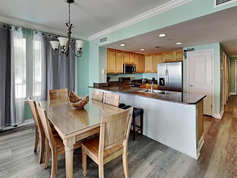 Kitchen or kitchenette, Seating area, Dining area, furniture, microwave, oven, air conditioner