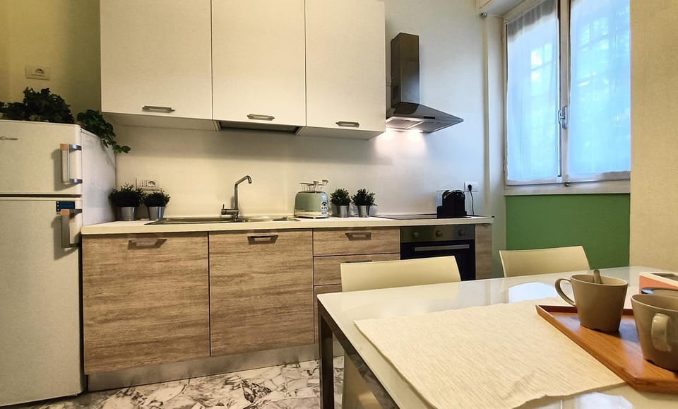 Dining area, dishwasher, stove, toaster