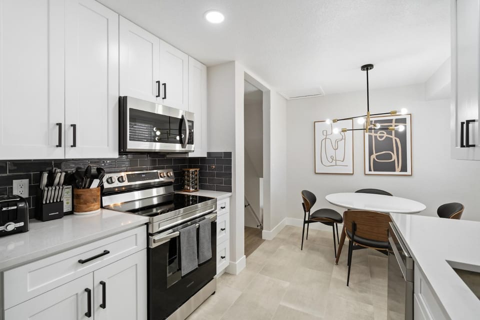 Dining area, stove, toaster, kitchen