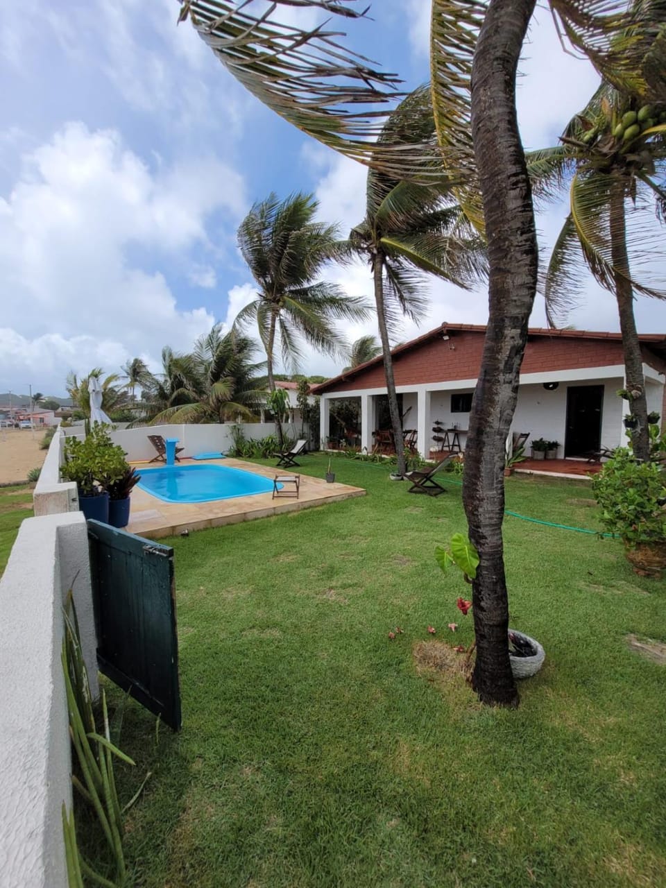 Property building, Patio, Spring, Day, Natural landscape, Garden, Garden view, Pool view, Swimming pool, sunbed
