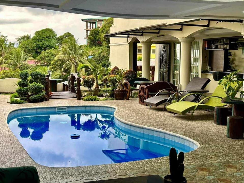Patio, Natural landscape, Garden, Seating area, Garden view, Pool view, Swimming pool, sunbed