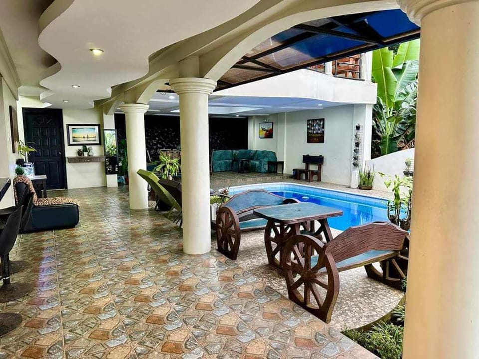 Patio, Seating area, Pool view, Swimming pool
