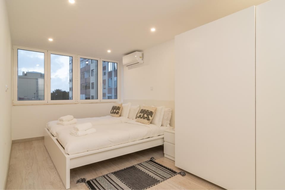 Bed, Living room, Seating area, Bedroom, towels, air conditioner