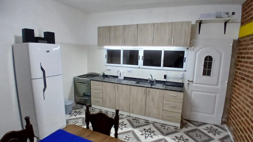 Kitchen or kitchenette, oven, stove