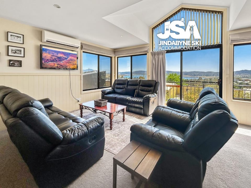 Living room, Seating area, Lake view, Mountain view, air conditioner