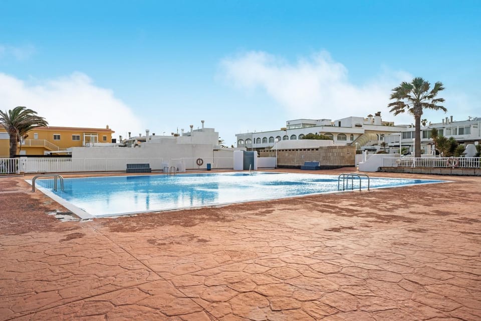 Property building, Living room, Swimming pool
