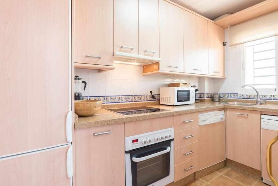 Kitchen or kitchenette, oven, stove, toaster