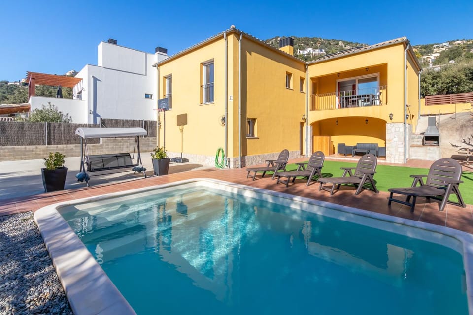 Property building, Living room, Swimming pool