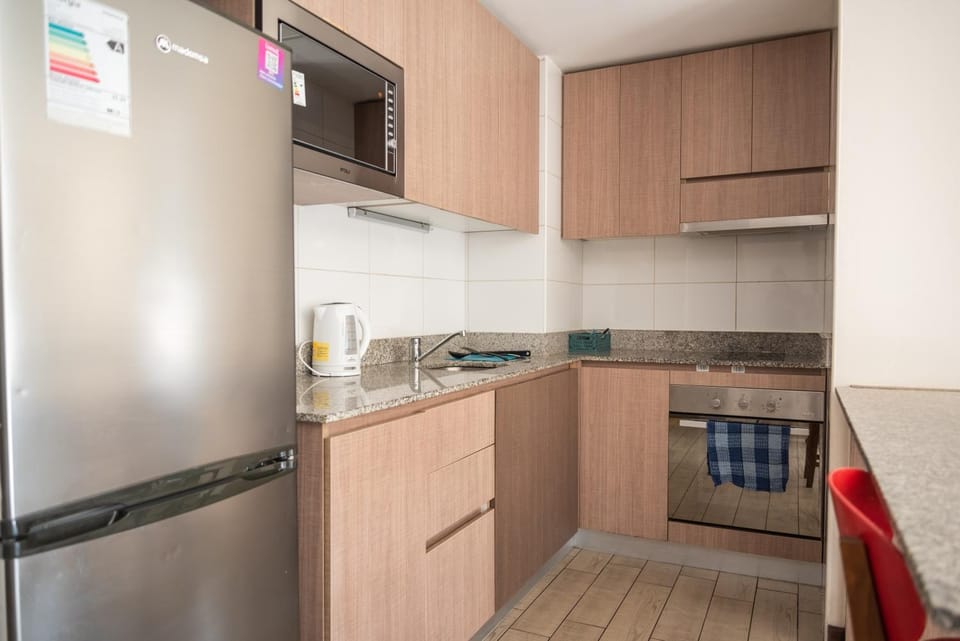 Kitchen or kitchenette, oven