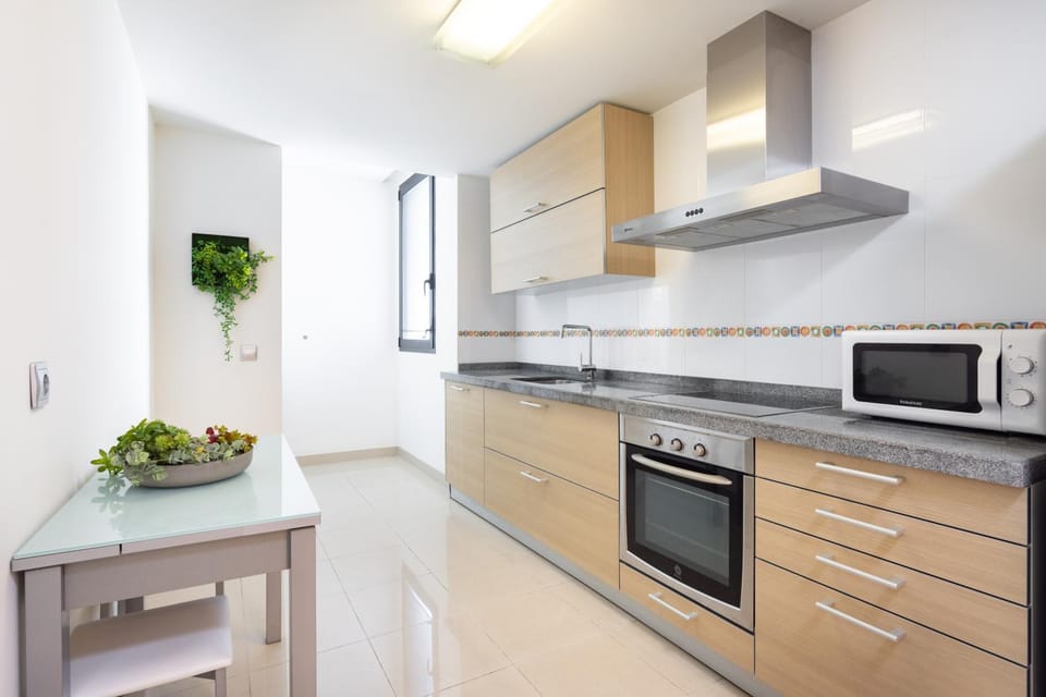 Kitchen or kitchenette, oven, stove, toaster