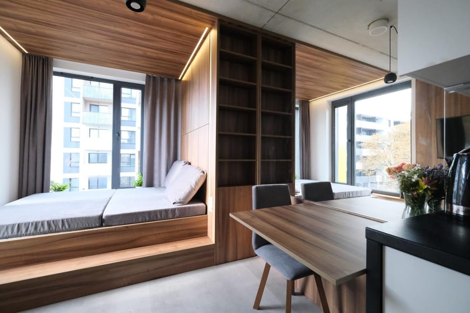 Seating area, minibar, towels, washing machine, kitchen
