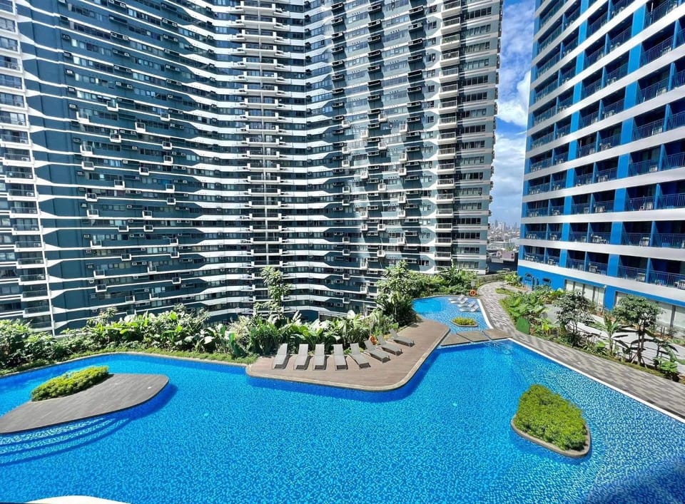 Property building, Day, Natural landscape, City view, Pool view, Swimming pool