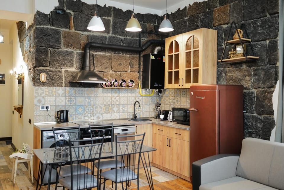 Kitchen or kitchenette, Seating area, Dining area, dishwasher, stove, toaster