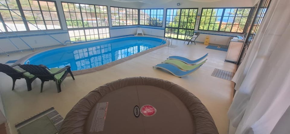 Property building, Living room, Swimming pool