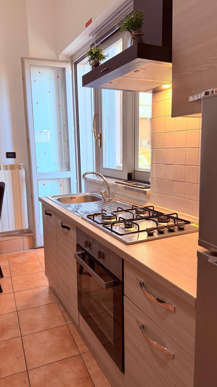 Kitchen or kitchenette, stove